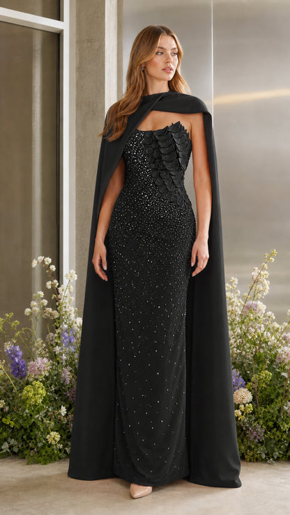 Classic black formal evening gown with draped cape overlay and sequin detail