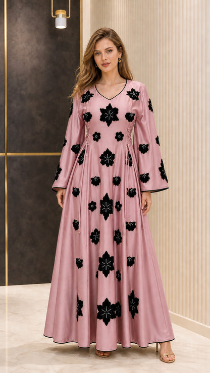 Full-length view of Dusty Rose satin maxi dress with contrast black floral details