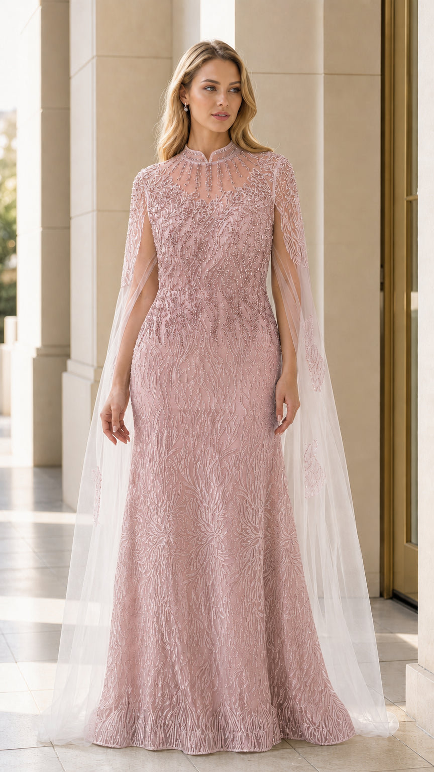 Full length dusty pink beaded cape evening dress on model