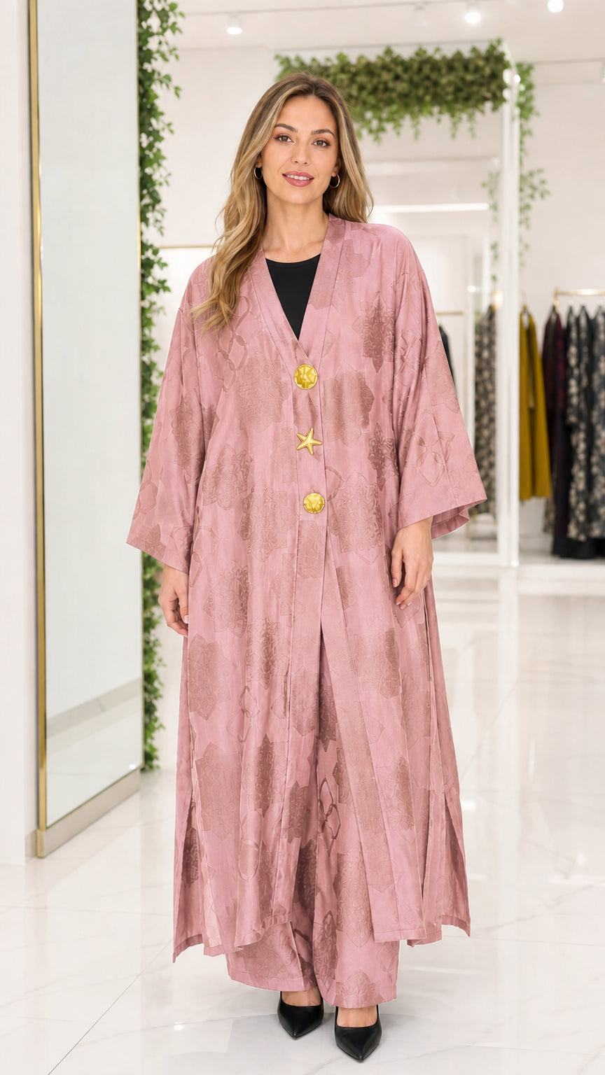 Front view of dusty rose pink jacquard maxi abaya with gold buttons