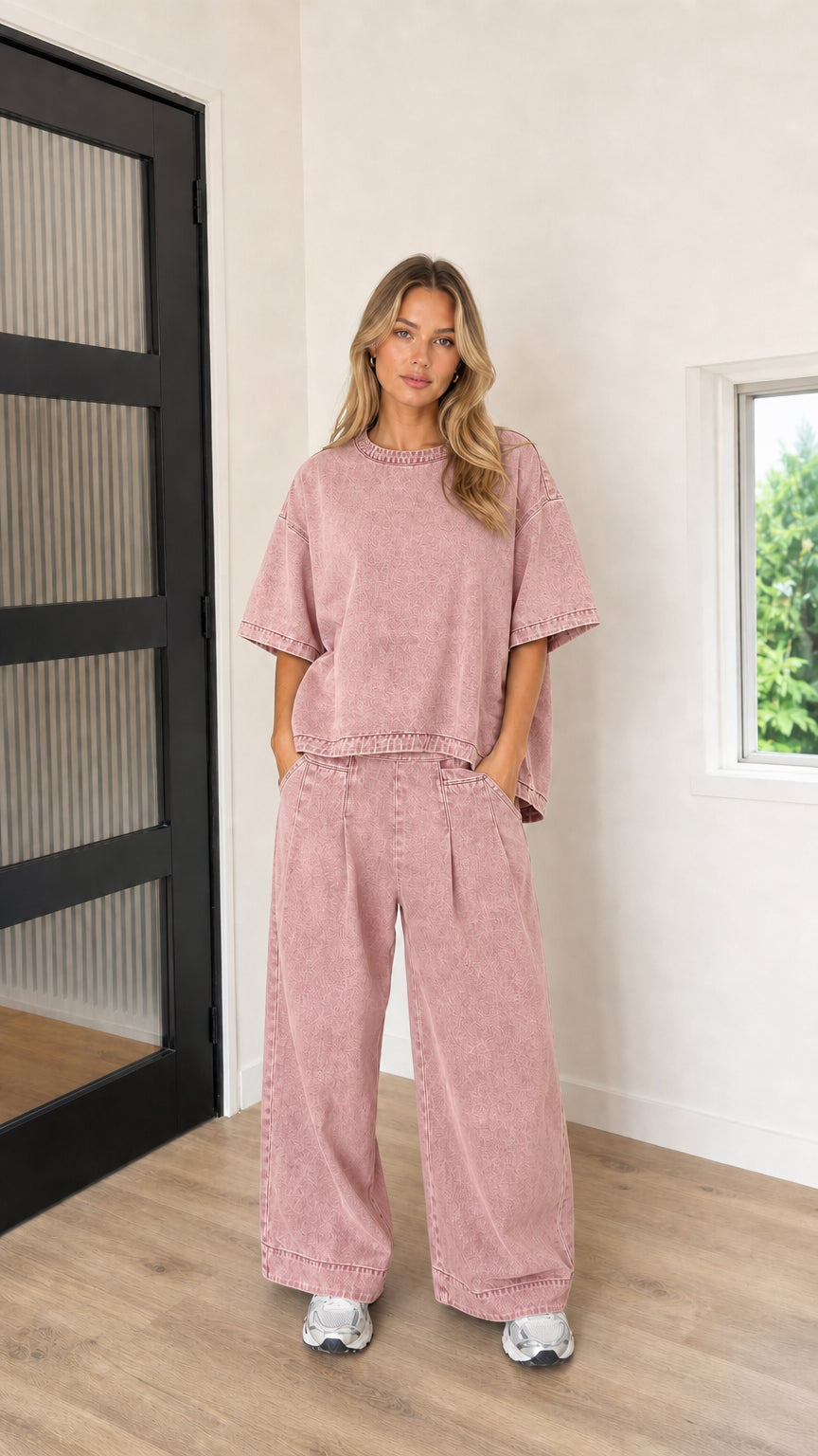 Model wearing Washed Pink oversized casual tee and wide-leg pleated lounge pants set