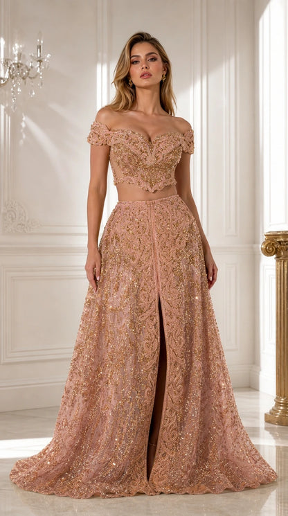 Front view of blush pink embroidered two-piece formal dress with slit