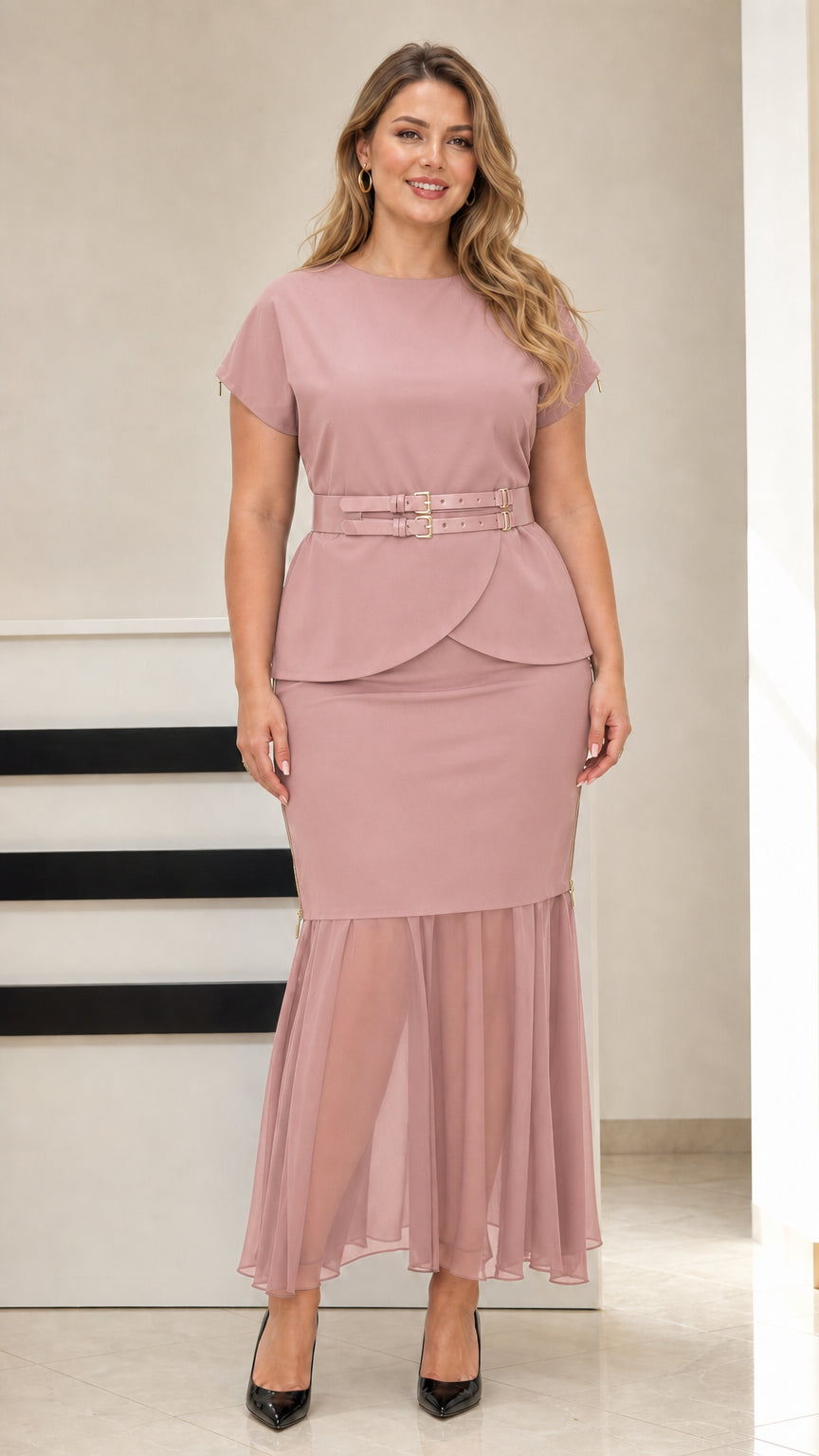 Model wearing dusty pink belted peplum top and matching chiffon mermaid skirt