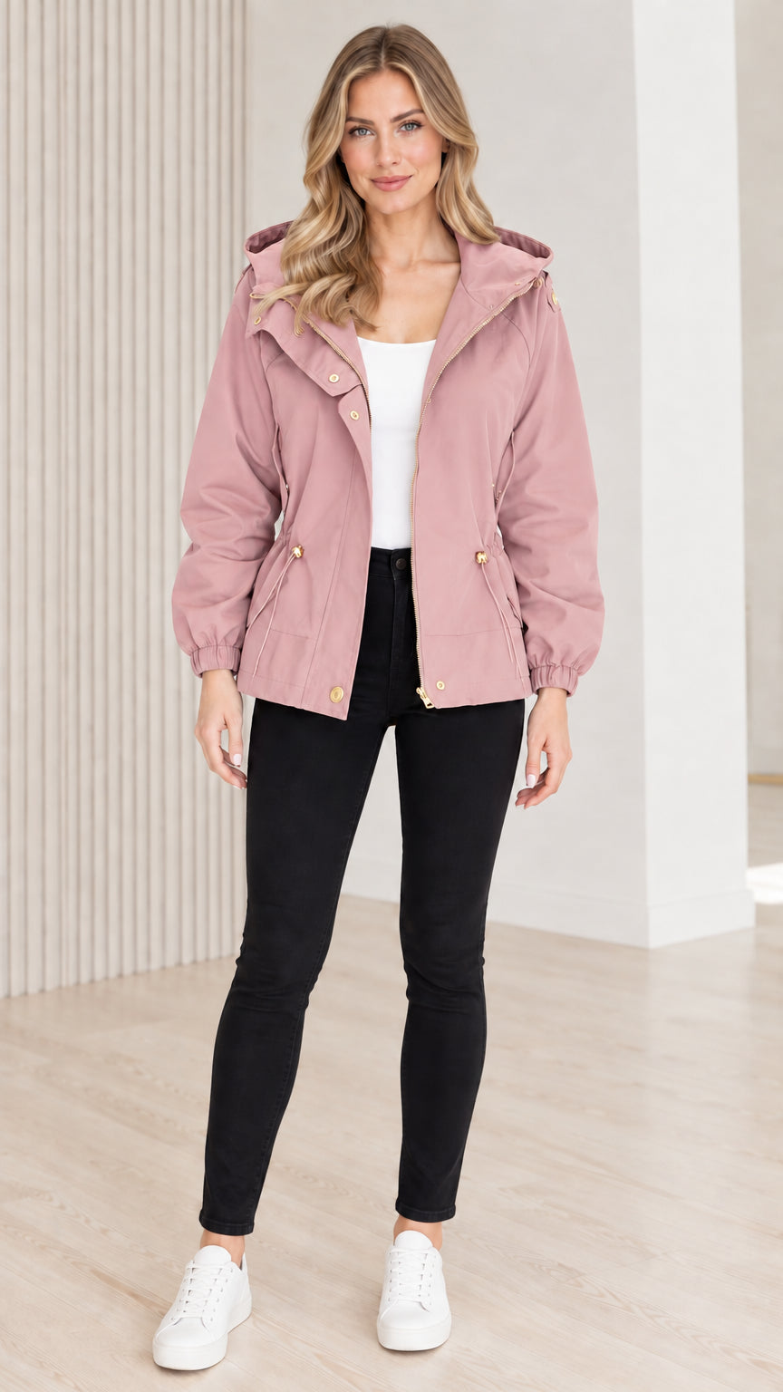 Front view of model wearing dusty pink hooded drawstring utility jacket