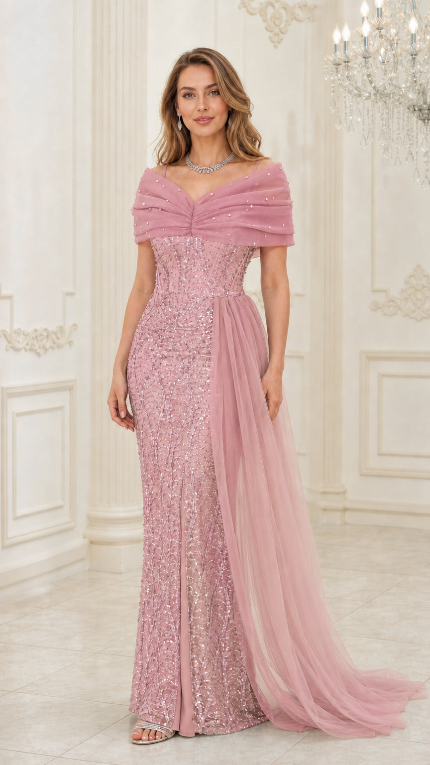 Front view of woman wearing blush pink sequin formal gown with side tulle train
