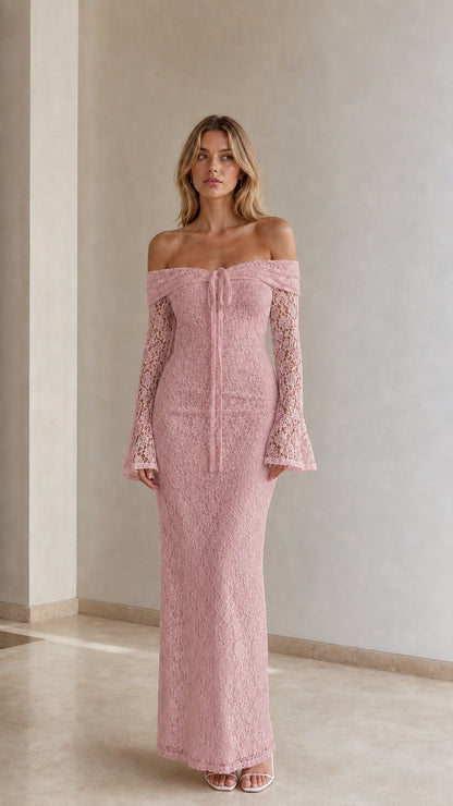 Woman wearing dusty pink off-the-shoulder bell sleeve lace maxi gown