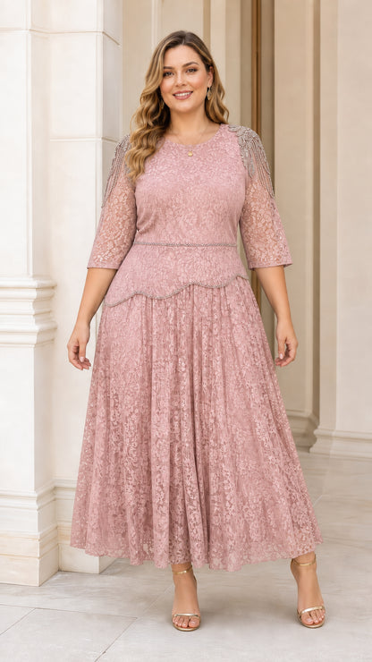 Front view of plus size model wearing dusty pink lace dress