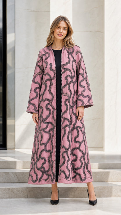 Model wearing Dusty Rose pink embellished open front maxi abaya
