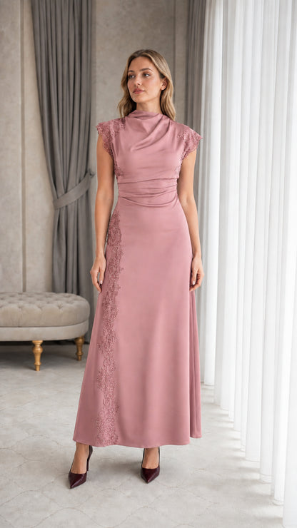 Full-length view of woman wearing dusty rose mock neck formal maxi dress