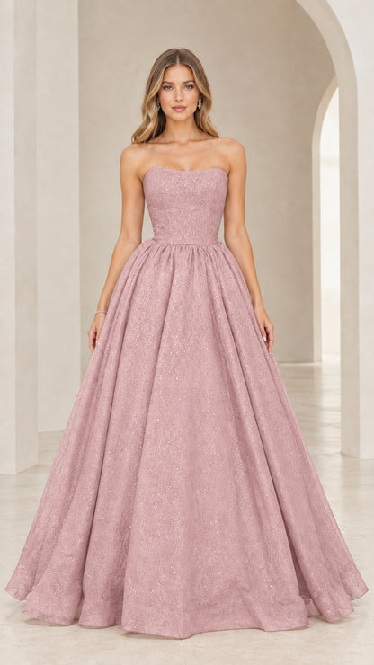 Front view of model in dusty rose strapless glitter evening gown