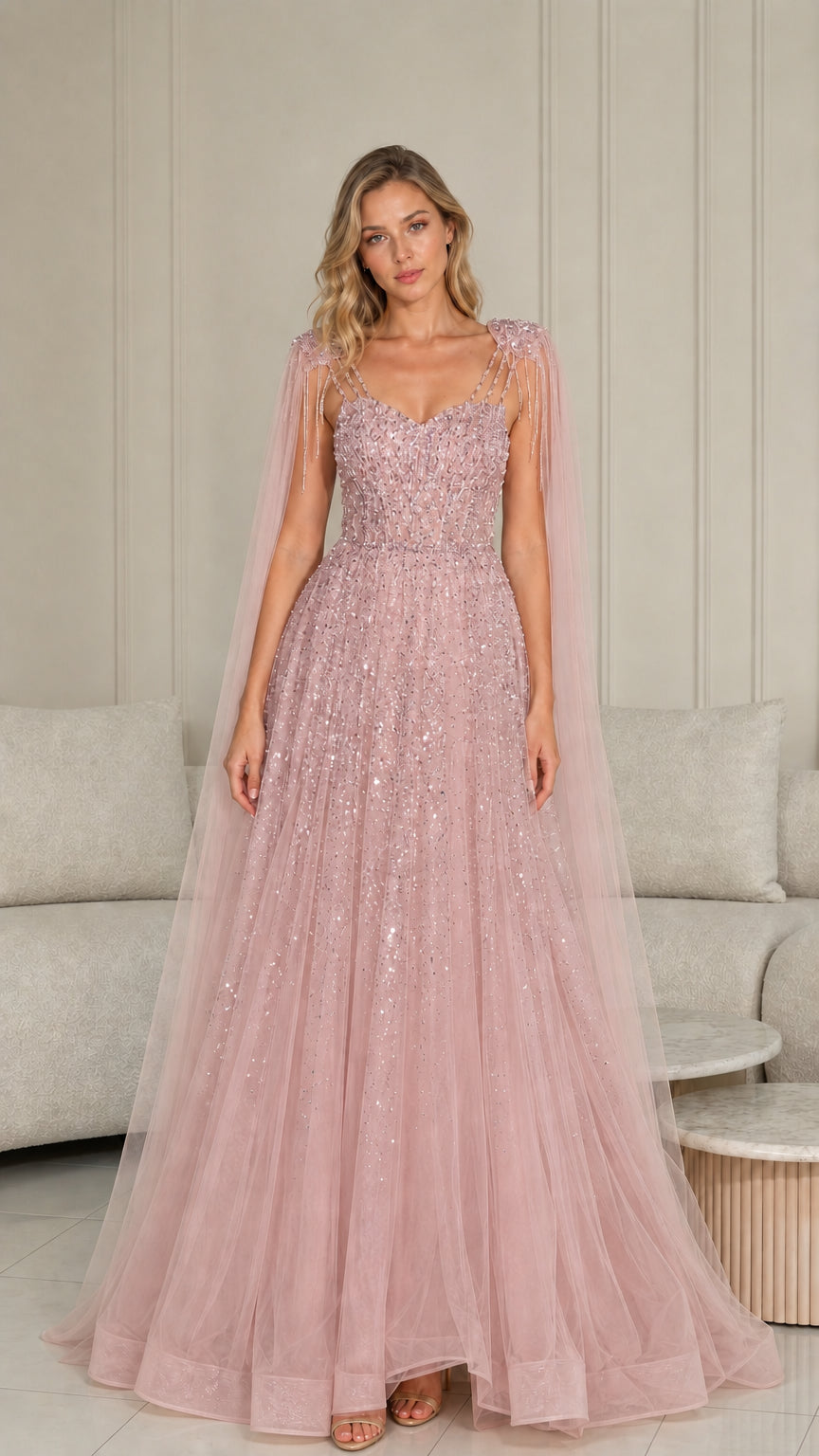 Blush pink sequin A-line tulle gala gown with draped cape sleeves