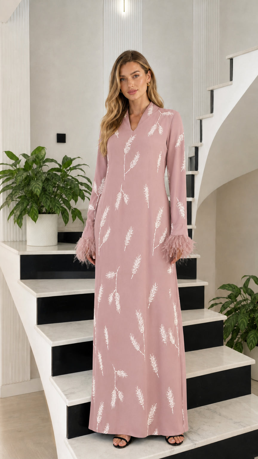 Front view of dusty pink embroidered maxi dress with feather cuffs