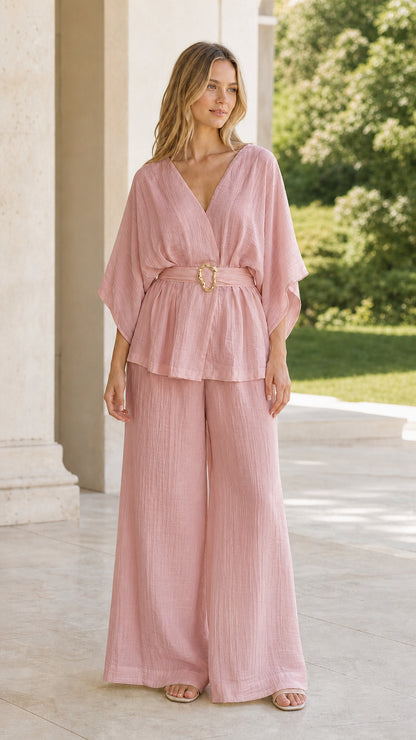 Model wearing dusty pink belted kimono top and wide-leg pant set