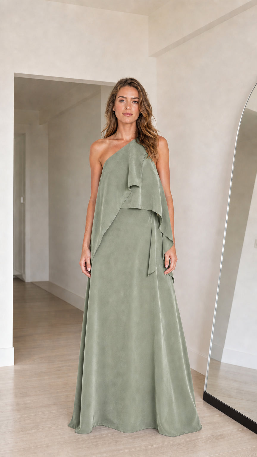 Model wearing sage green one-shoulder draped formal maxi dress