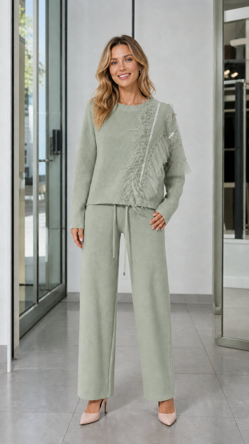 Full-length front view of woman wearing Sage Green knit sweater and matching wide-leg pants