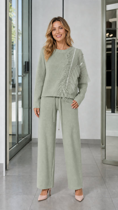 Full-length front view of woman wearing Sage Green knit sweater and matching wide-leg pants