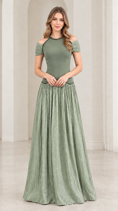 Woman wearing sage green cold shoulder beaded pleated maxi dress