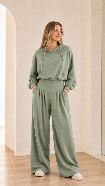 Full-body view of model wearing sage green 2-piece wide-leg hoodie set