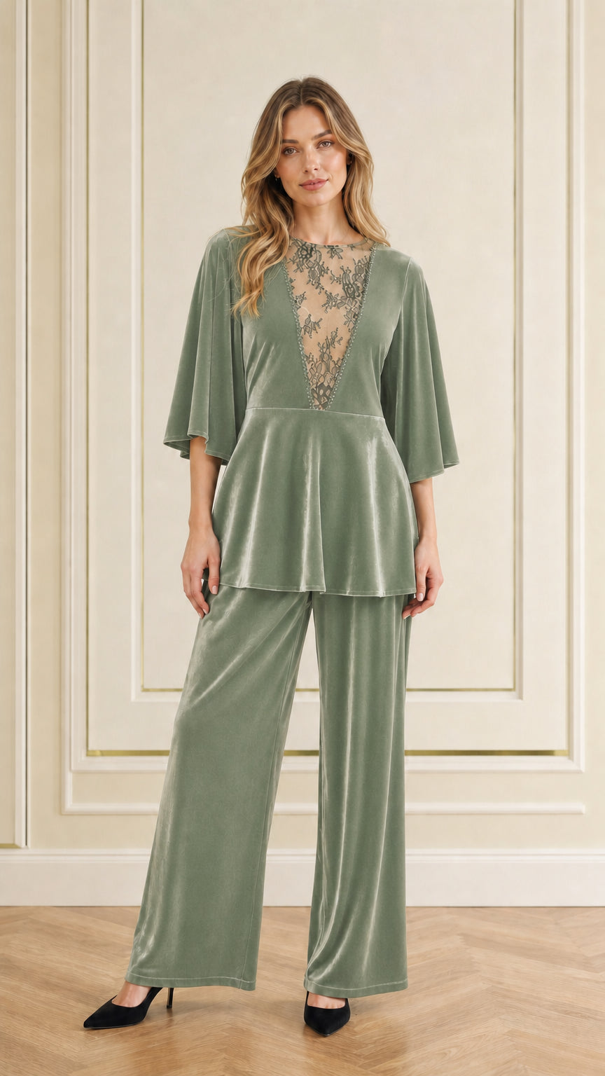 Front view of woman wearing sage green velvet two-piece pant set