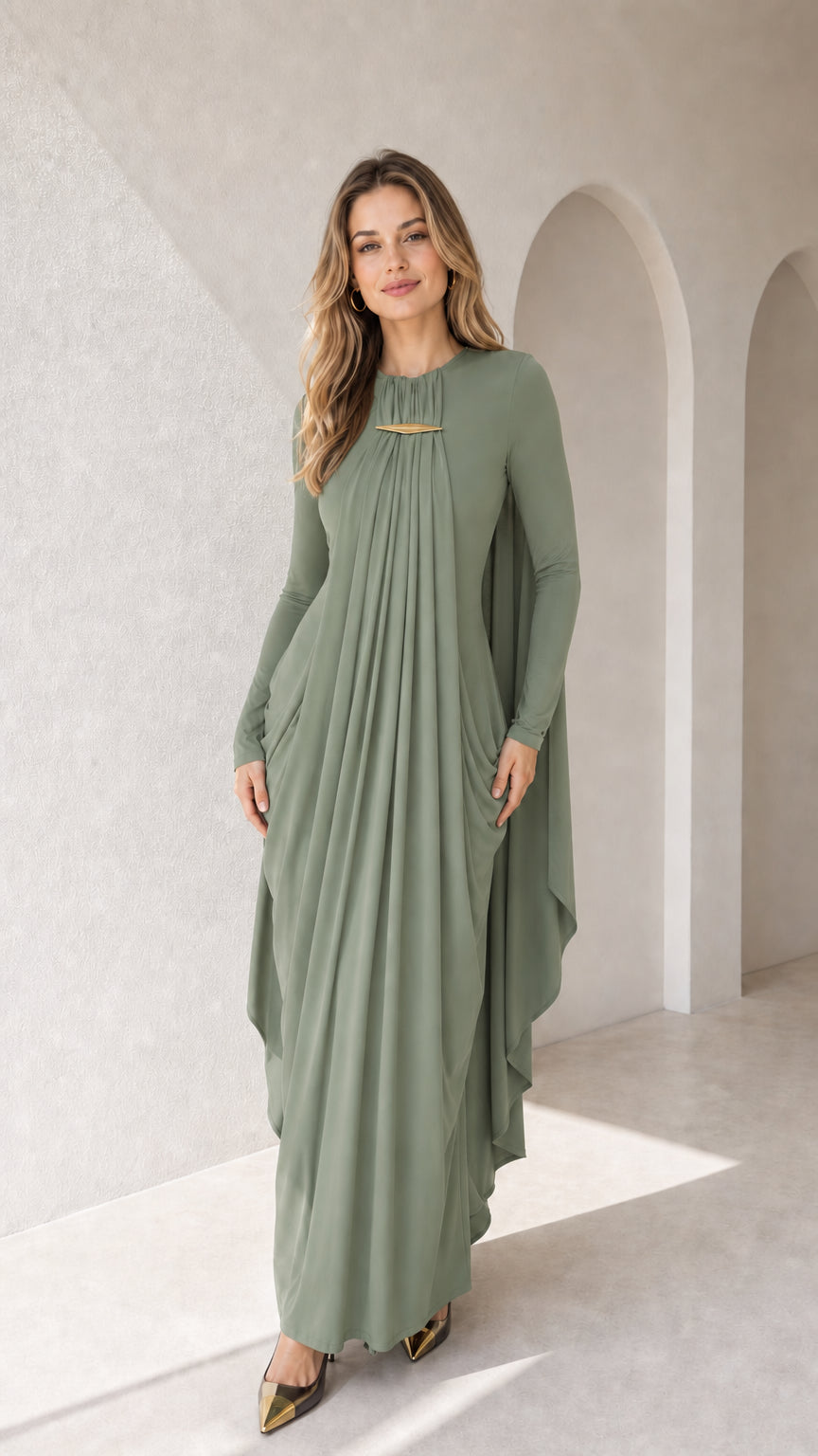 Full-length front view of sage green pleated cape long sleeve maxi gown
