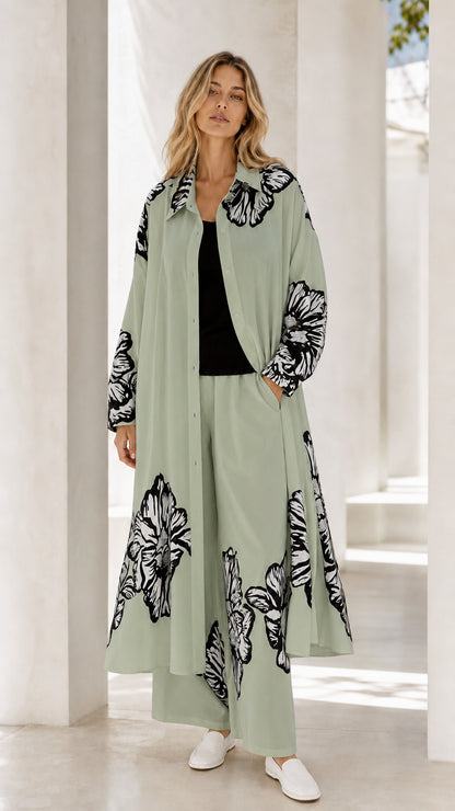 Full front view of sage green floral print long duster and matching pant set