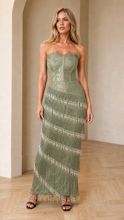 Model wearing sage green strapless lace corset beaded fringe maxi dress