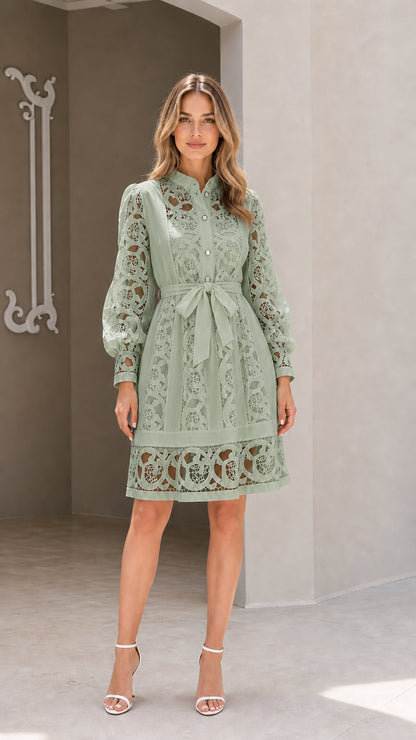 Model wearing sage green long sleeve embroidered lace belted shirt dress