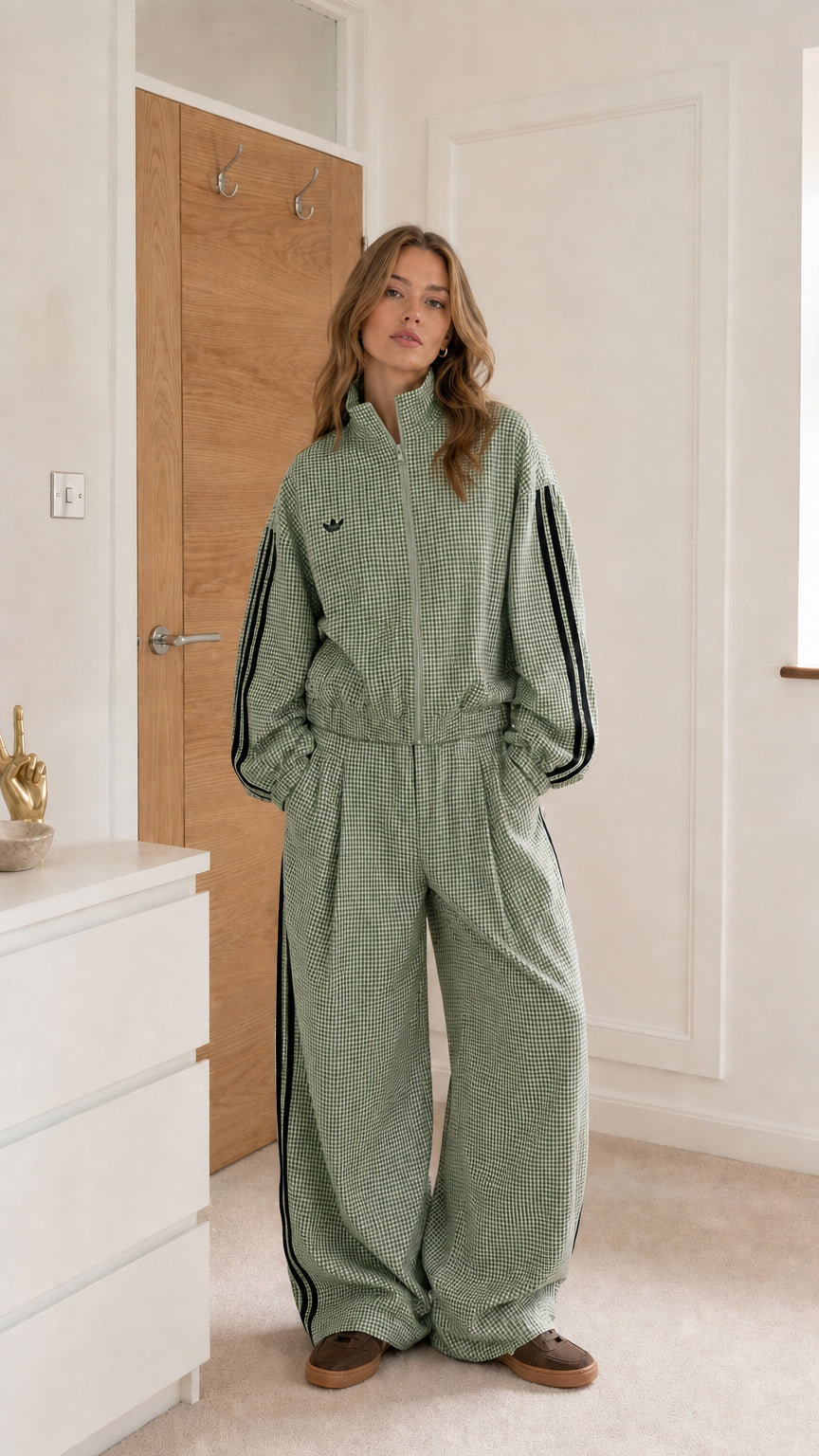 Sage green gingham women's track stripe jumpsuit shown from the front