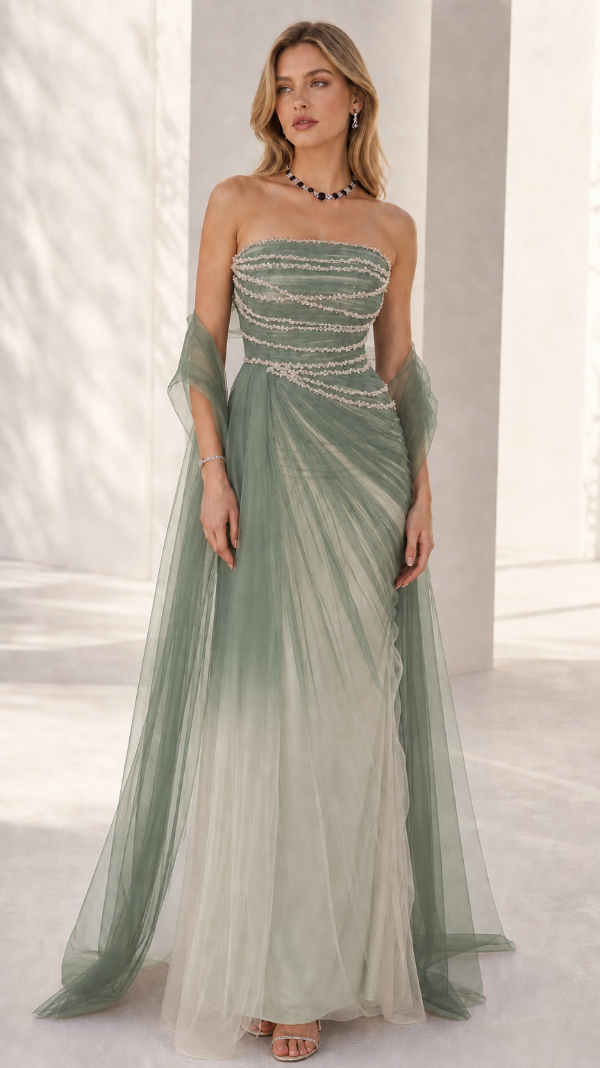 Front view of the strapless beaded formal gown in sage green ombre tulle