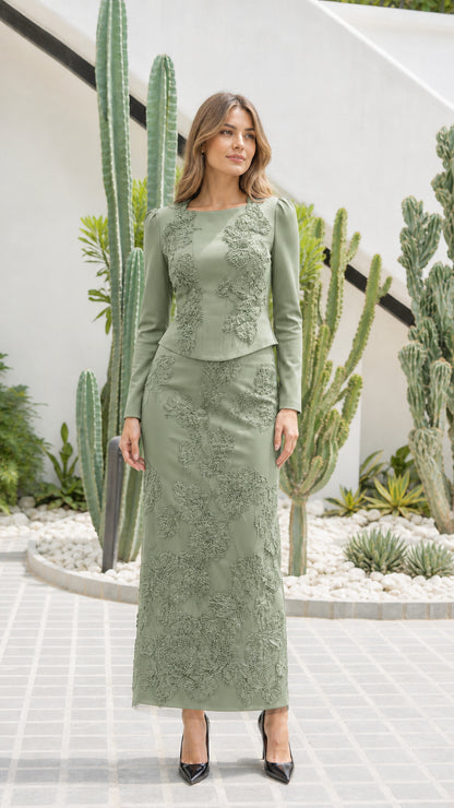 Front view of sage green embroidered long-sleeve formal maxi skirt set