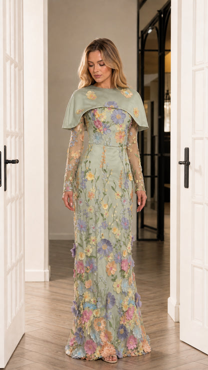 Front view of sage green floral applique formal maxi dress with capelet