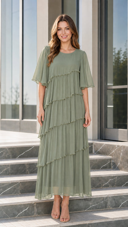 Front view of woman wearing sage green tiered chiffon maxi dress
