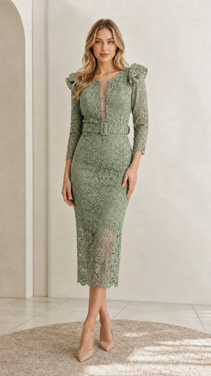 Front view of model wearing sage green floral lace belted midi dress with ruffle shoulders