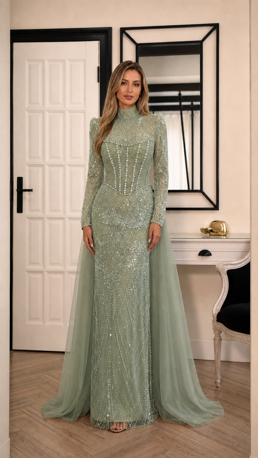 Model wearing sage green embellished long sleeve formal gown with overskirt