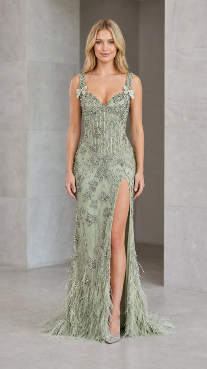 Front view of model in sage green sequin corset evening gown with feather hem