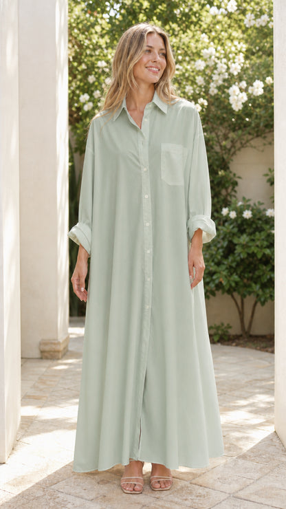 Woman wearing sage green oversized collared maxi shirt dress