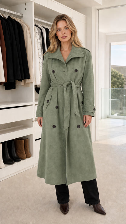 Front view of model wearing sage green faux suede belted long trench coat