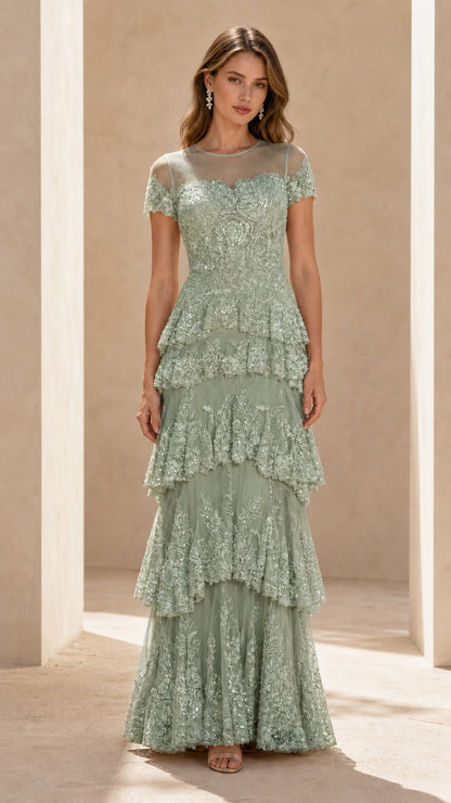 Front view of sage green sequined tiered evening dress