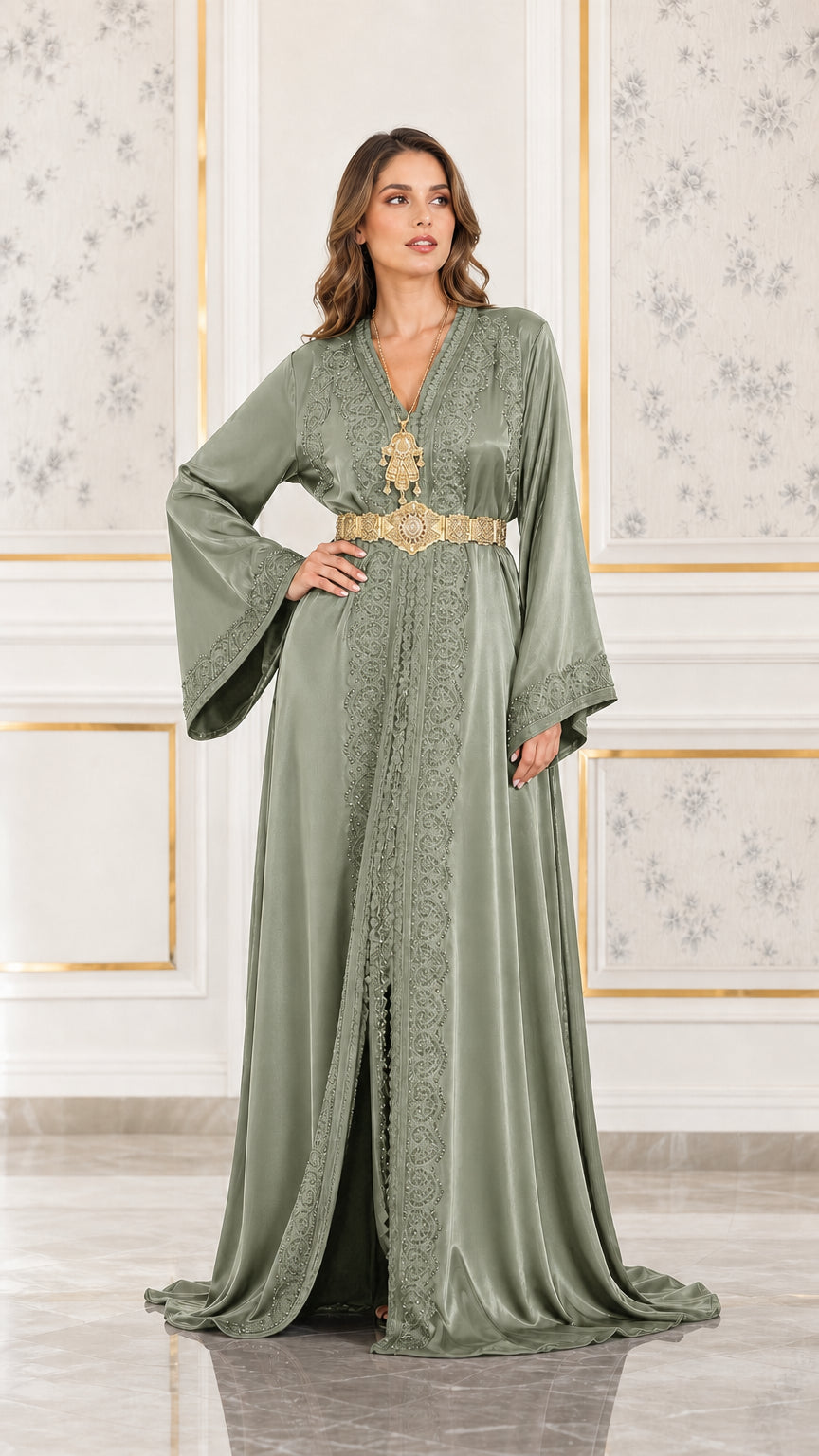 Full front view of sage green embroidered satin caftan maxi dress with ornate belt
