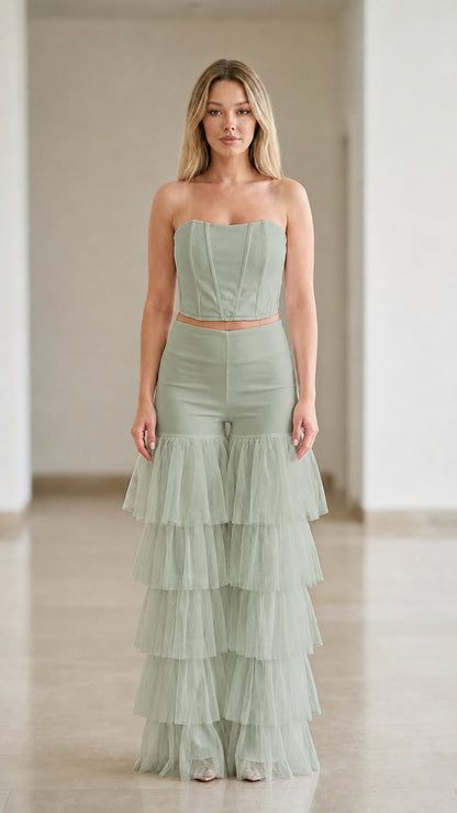 Sage green two-piece formal set with strapless bodice and tiered tulle pants