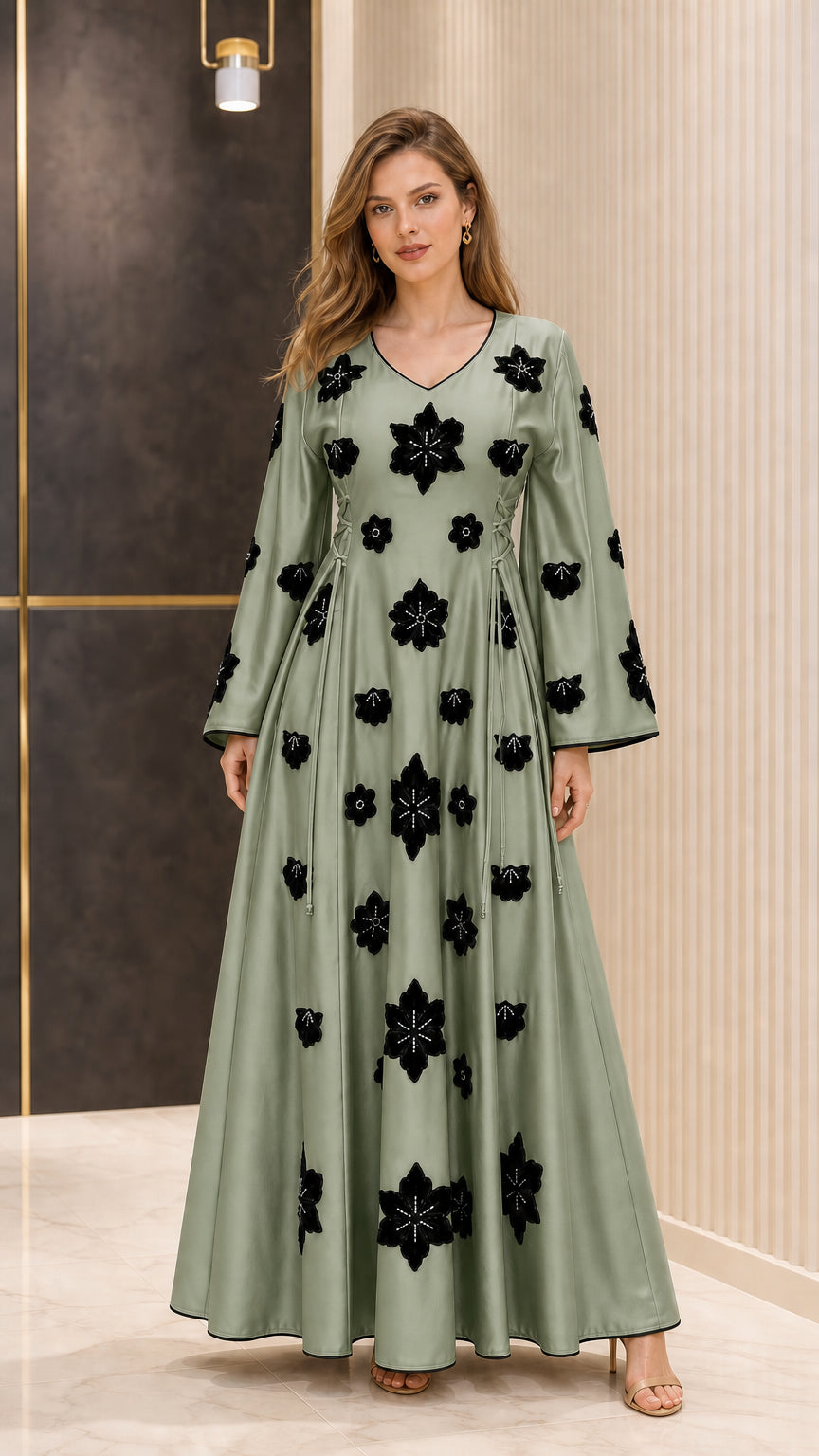 Full-length view of Sage Green satin maxi dress with contrast black floral details
