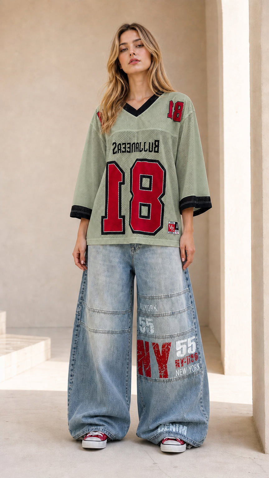 Full front view of sage green relaxed mesh football jersey top