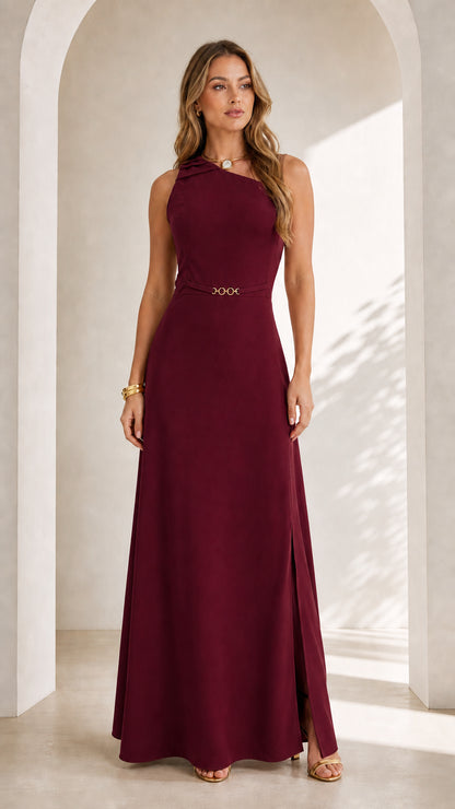 Front full view of woman wearing burgundy wine sleeveless asymmetrical maxi dress