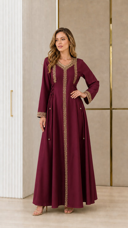 Model wearing burgundy wine embroidered kaftan maxi dress
