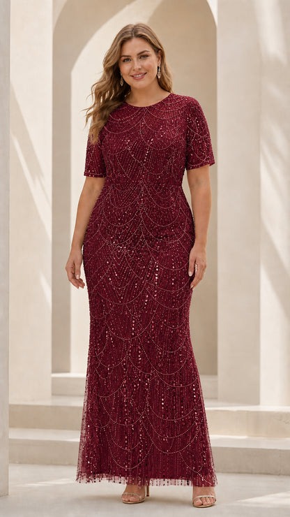 Front view of woman wearing Burgundy beaded short sleeve evening gown
