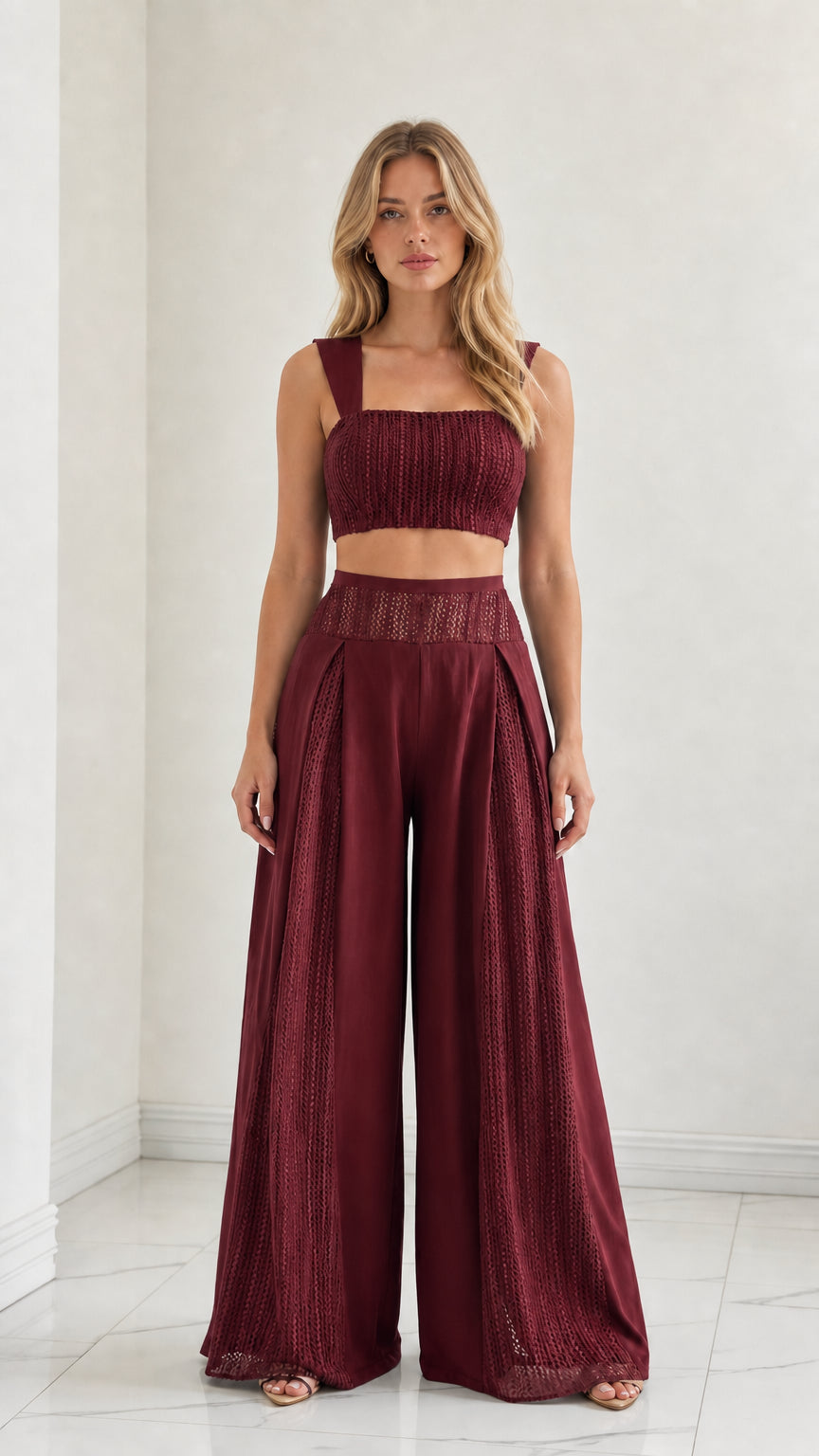 Model wearing Burgundy red textured crop top and high-rise palazzo pants set
