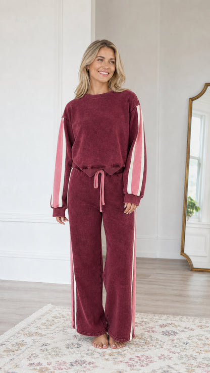 Front view of model wearing the Burgundy wine-red two-piece lounge tracksuit set