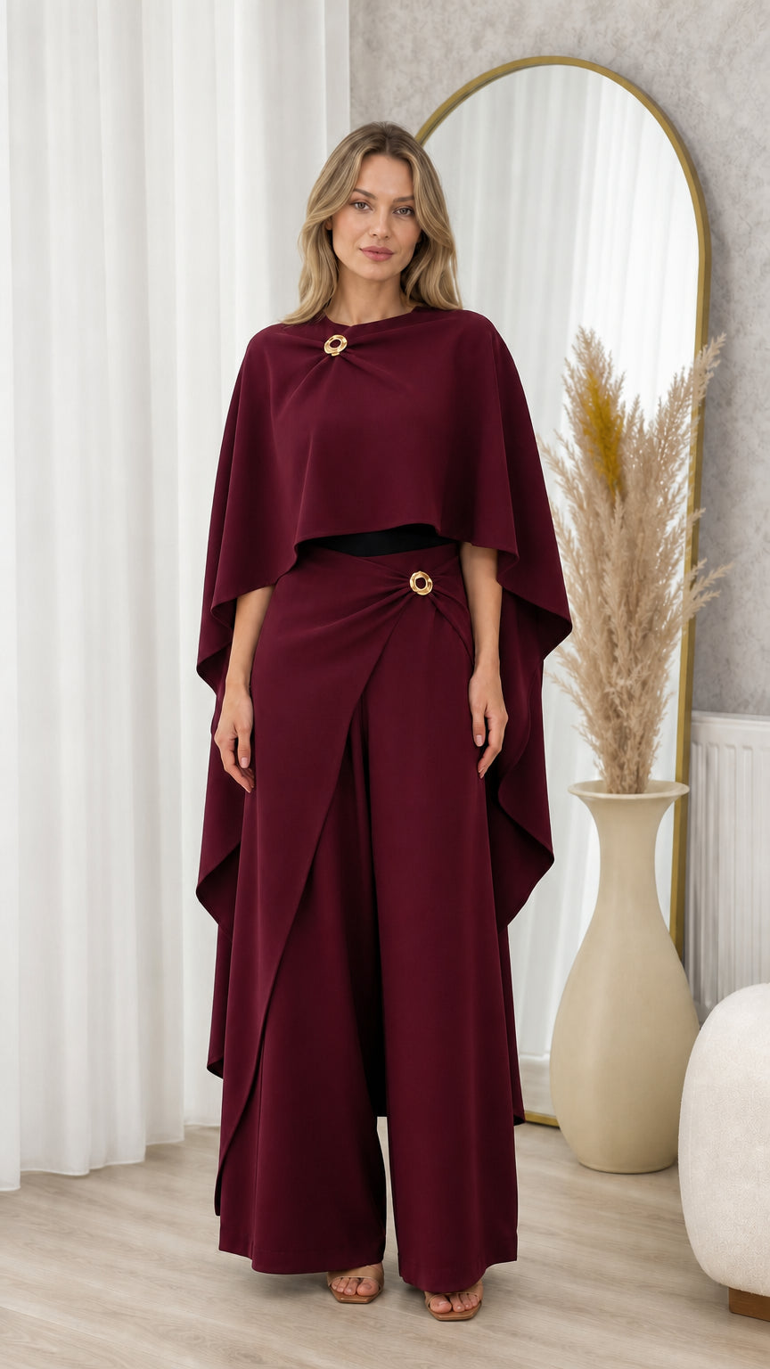 Full front view of burgundy wine draped capelet and matching wide-leg pants set