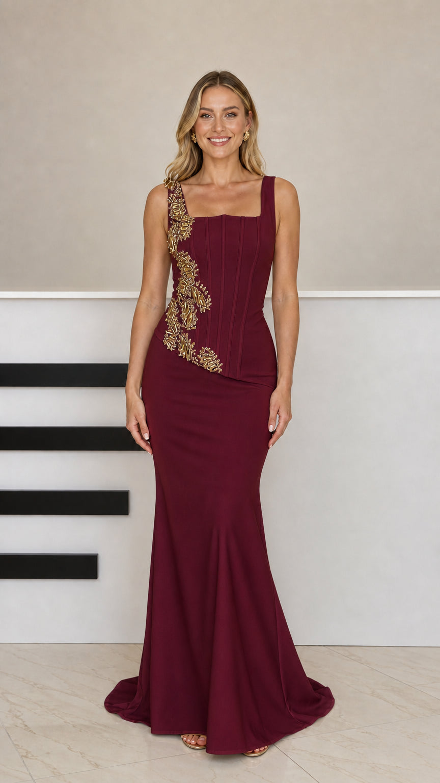 Front full-length view of model wearing burgundy wine red mermaid evening dress