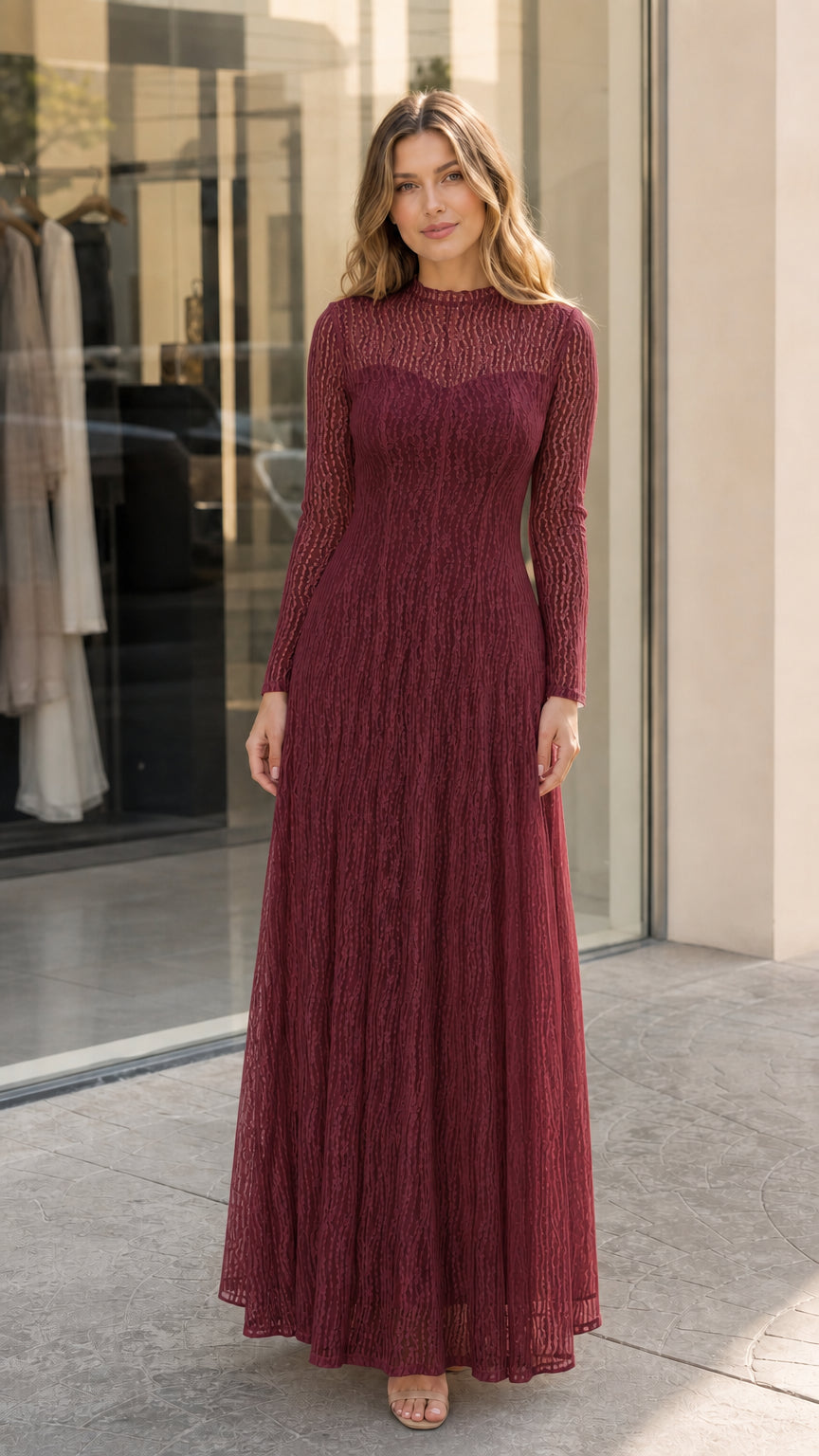 Model wearing the long sleeve lace illusion maxi dress in deep Burgundy